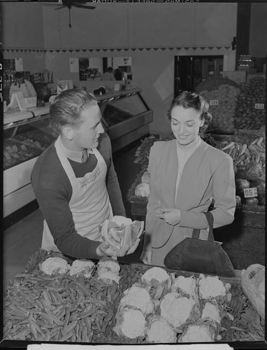 Lois Erwin and grocery clerk for Sunset ad
