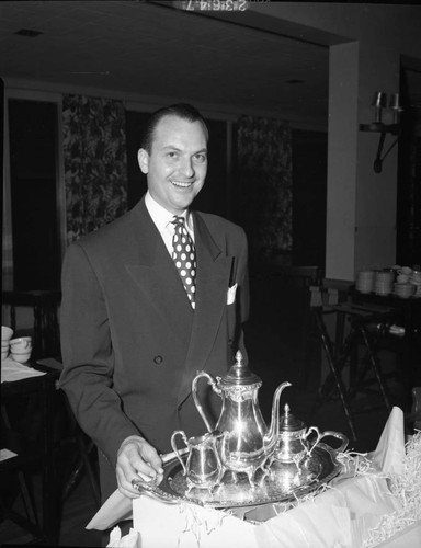 Man with silver service