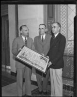 Paul Ritter and Hugh J. McGuire with Arthur Eldridge as he receives a laudation for his work, Los Angeles, 1934