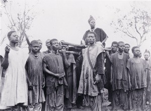 Nzabndunke, king Njoya's mother in a carrying chair, in Cameroon