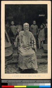 Elderly gentleman sitting holding a walking stick, Fujian, China, ca.1920-1937