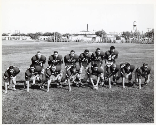 Football team photo on field