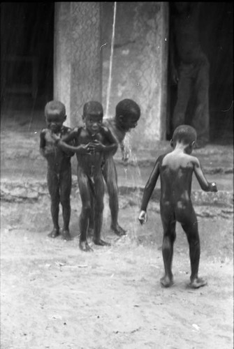 Children play under the rain, San Basilio de Palenque, 1975