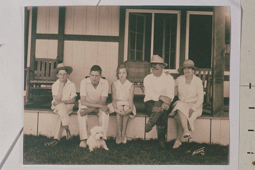 The Will Rogers Family (left to right) Jim, Will Jr., Mary, Will Sr., and Betty on the porch of the main house at the ranch in Rustic Canyon, Calif