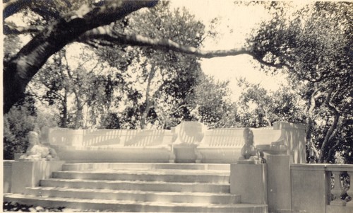 Outdoor seating at end of walkway, J. Waldron Gillespie Estate, Montecito