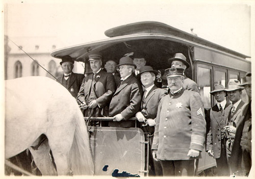 [Mayor James Rolph and other officials taking the last horse car ride on Market Street]