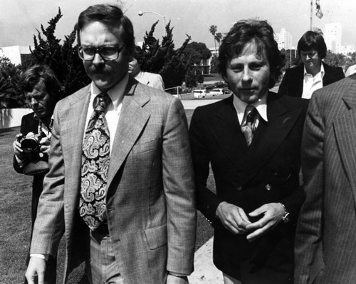 Roman Polanski and lawyer enter courthouse