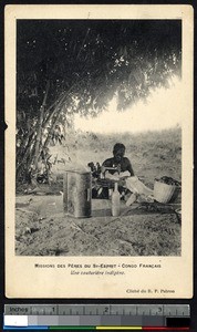 Indigenous woman using a sewing machine, Congo Republic, ca.1900-1930