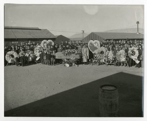 Exterior photograph of a funeral for Francis Fujino