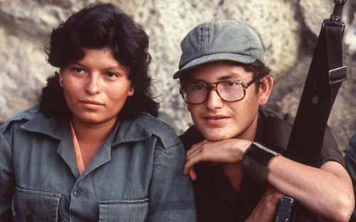 A guerrillero and a guerrillera sitting next to each other, La Palma, 1983