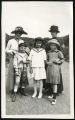 Photograph of Madame L. Genay, Camille Genay, and Marie-Louise Genay with friends