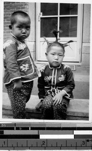 Two young children at orphanange, Fushun, China, 1938