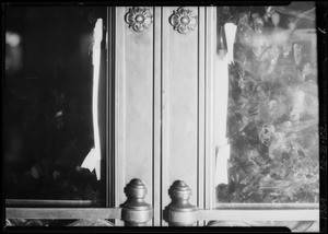 Blood stain on door of Pershing Square building, Los Angeles, CA, 1934