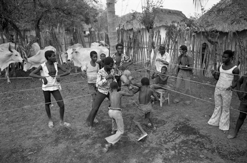 Children boxing in a ring, San Basilio de Palenque, 1977