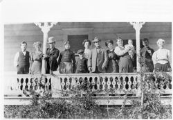 Family portrait of the Borba family on a porch
