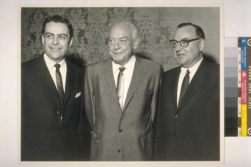 [Edmund G. Brown with two men.]