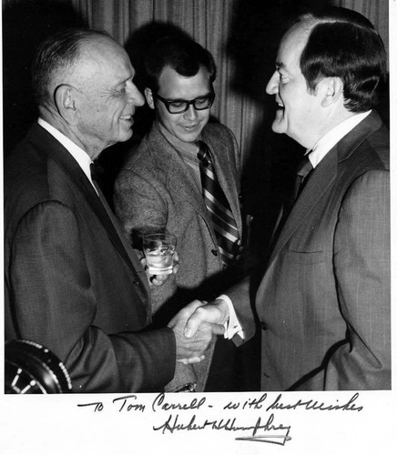 Senator Thomas C. Carrell shaking hands with Hubert Humphrey