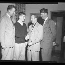 American Legion member with three other men