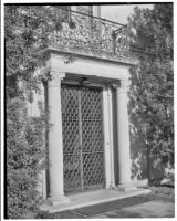 W. R. Dunsmore residence, exterior, view of doorway with metal grille gate, Los Angeles, 1930