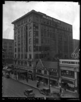 Los Angeles city street with Majestic Theater building, circa 1920
