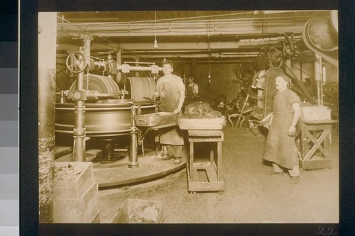 [Factory workers and machinery.]