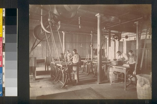 [Factory workers. Making chocolate bars?]