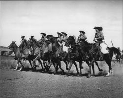 California Centaurs mounted junior drill team riding at the Sonoma County Fairgrounds, 1947
