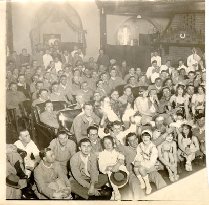 [Audience at the Letterman General Hospital annual Christmas show]