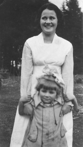 Agnes LeRoi with a child