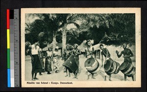 Drummers playing in a village, Congo, ca.1920-1940