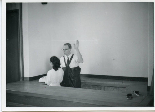Terry Giboney baptizing Makino San in Ota church