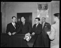 Frank Koehane, Jack Kearns, and various unidentified men in courtroom, Los Angeles, 1934