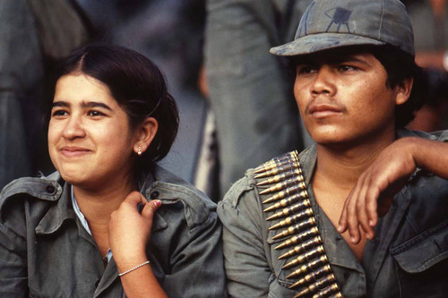 Two guerrilleros watching, La Palma, Chalatenango, 1983
