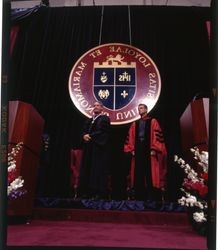 Chad Dreier and Robert Lawton, S.J., on stage at president inauguration