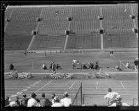 Distant view of a race at the S.C. and Stanford dual track meet at the Coliseum, Los Angeles, 1934
