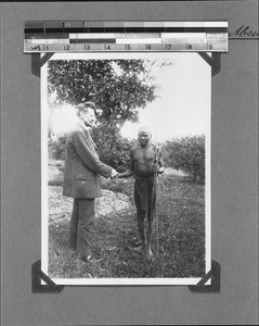 Missionary Gemuseus with an African, Rungwe, Tanzania, ca.1925-1939