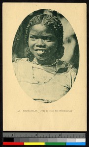 Bust portrait of a smiling girl, Madagascar, ca.1920-1940
