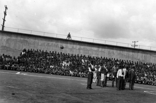 Prisoner athletes and officials on the field, San Quentin Little Olympics Field Meet, 1930 [photograph]