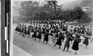 Schoolgirls exercising outdoors, Japan, ca. 1920-1940