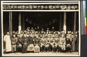 Japanese military officers seated with a large group of people, China, ca.1938