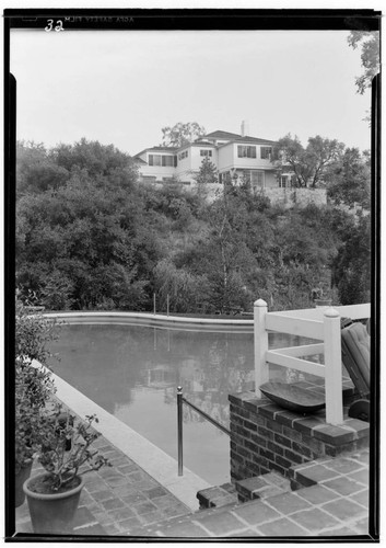 Loy, Myrna, and Arthur Hornblow, residence. Exterior and Swimming pool