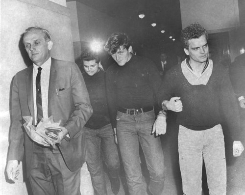 Nazi chain gang members handcuffed