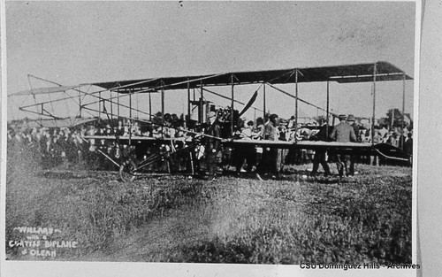 Charles Willard with Curtiss biplane