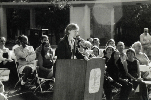 President Trombley speaking in front of McConnell Center