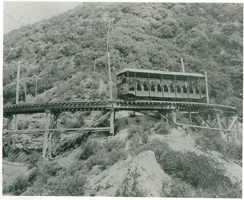 Pacific Electric Car on Curving Rail in the Mountains