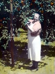 Bess Barlow Hallberg in the apple orchard