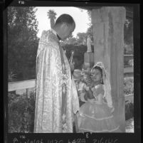 Blessing of the animals, Rev. Bernard O'Connor, pastor Old San Gabriel Mission, Calif., 1962