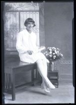 Portrait of young woman with diploma, c. 1928