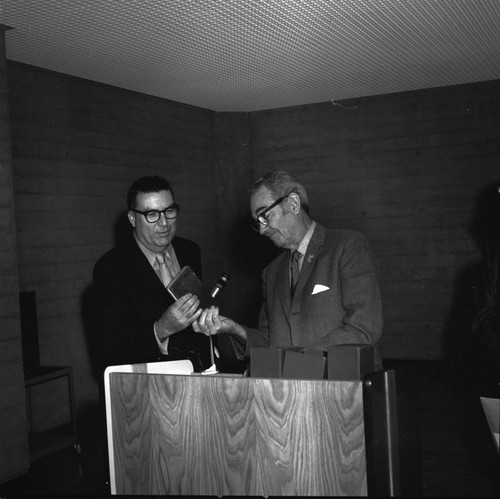 UCSD Chancellor, Herbert York (left) and Chair of the Friends of the UCSD Libraries, Francis Smith during ceremony commemorating the 3/4 million books at UCSD Libraries. November 24, 1970