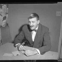 A man sitting at a desk